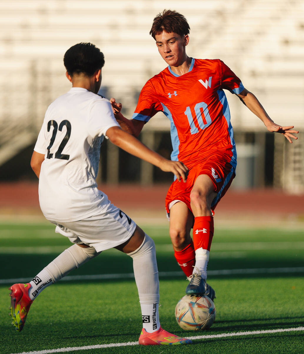 Western midfielder Calvin Kilpatrick (10) kicks the ball as Las Vegas midfielder David Montes ( ...