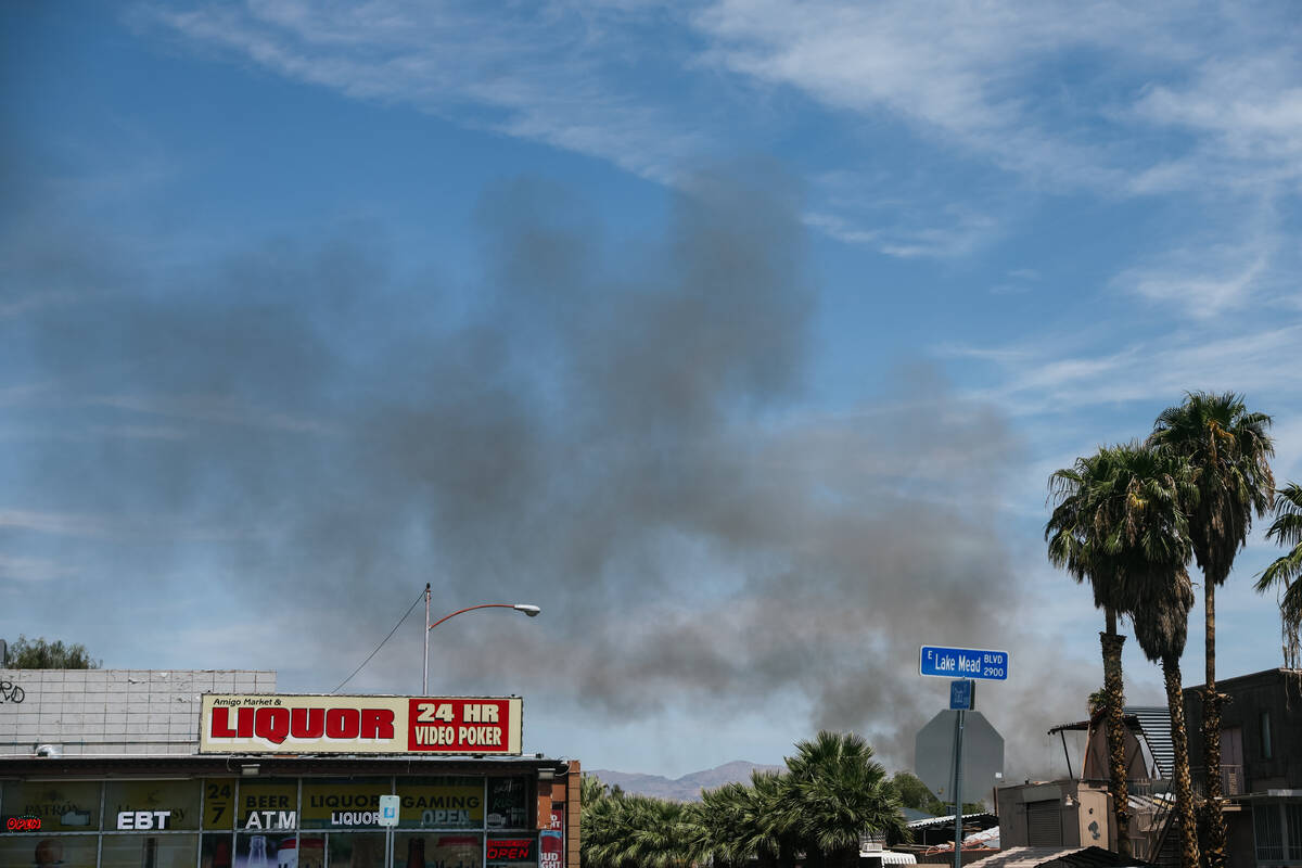 Smoke seen from Lake Mead Blvd as North Las Vegas and Clark County fire crews respond to a fire ...