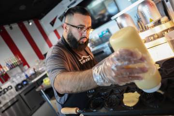Lost Sweets owner Mike Tafoya makes Taiyaki on Wednesday, Aug. 20, 2025, in Las Vegas. “ ...