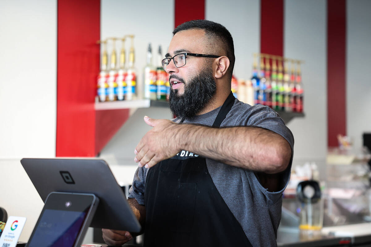 Lost Sweets owner Mike Tafoya interacts with customers on Wednesday, Aug. 20, 2025, in Las Vega ...