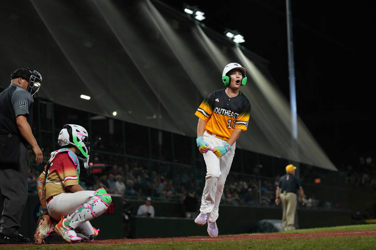 Irmo, S.C 's Brody Miller, front right, celebrates during the fifth inning of a baseball game a ...