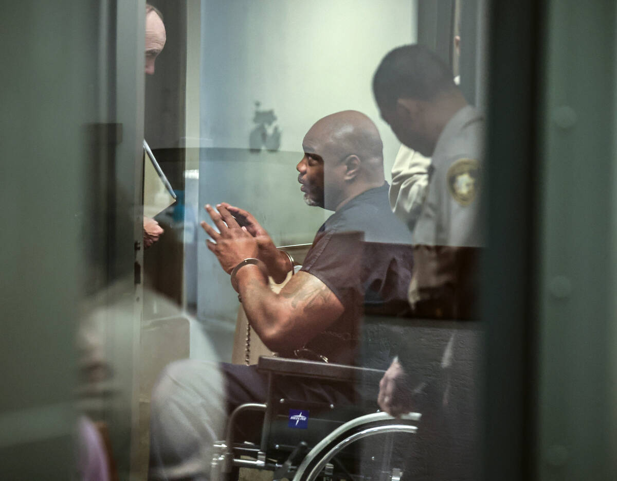 Quenton Brown, father of NBA star Jaylen Brown, speaks with his lawyers after making his initia ...
