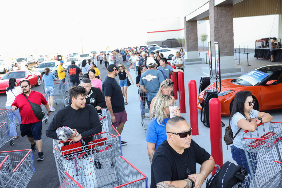People wait in line to enter the newly opened Costco at 6880 S. Buffalo Drive on Thursday, Aug. ...