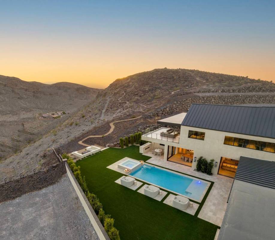 Located at 23 Sanctuary Peak Court in Ascaya, the home is filled with rustic amenities adding t ...