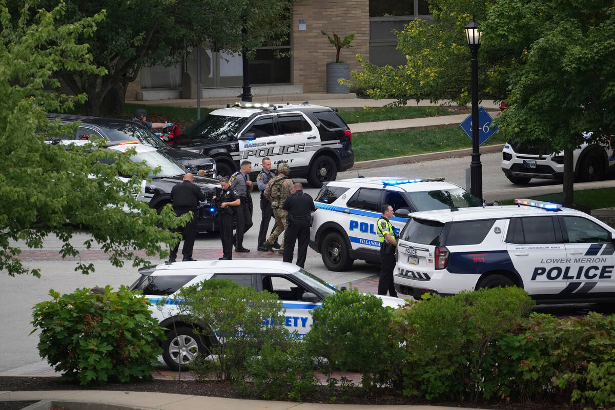 Police gather at the Villanova University campus where an active shooter was reported Thursday, ...