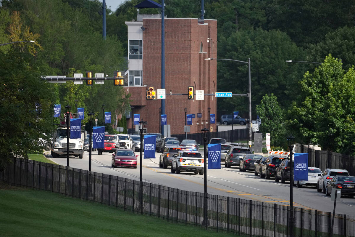Police vehicles arrive at the Villanova University campus where an active shooter was reported ...