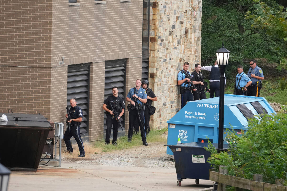 Police gather at the Villanova University campus where an active shooter was reported Thursday, ...