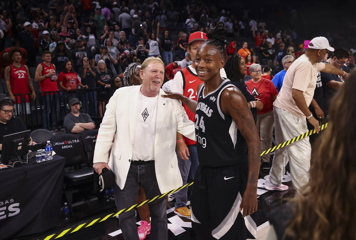 Aces owner Mark Davis greets Aces guard Jewell Loyd after the team’s defeat over the Pho ...