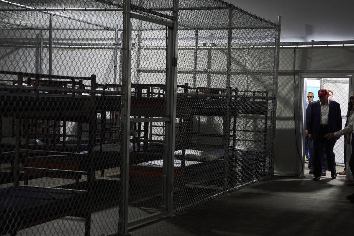 FILE - President Donald Trump tours "Alligator Alcatraz," a new migrant detention fac ...