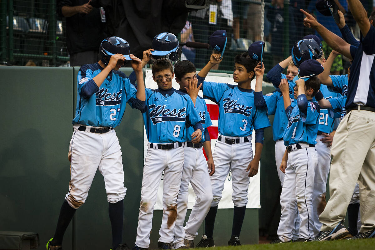 Las Vegas lifts its hats before departing the field following the U.S. Championship Game of the ...