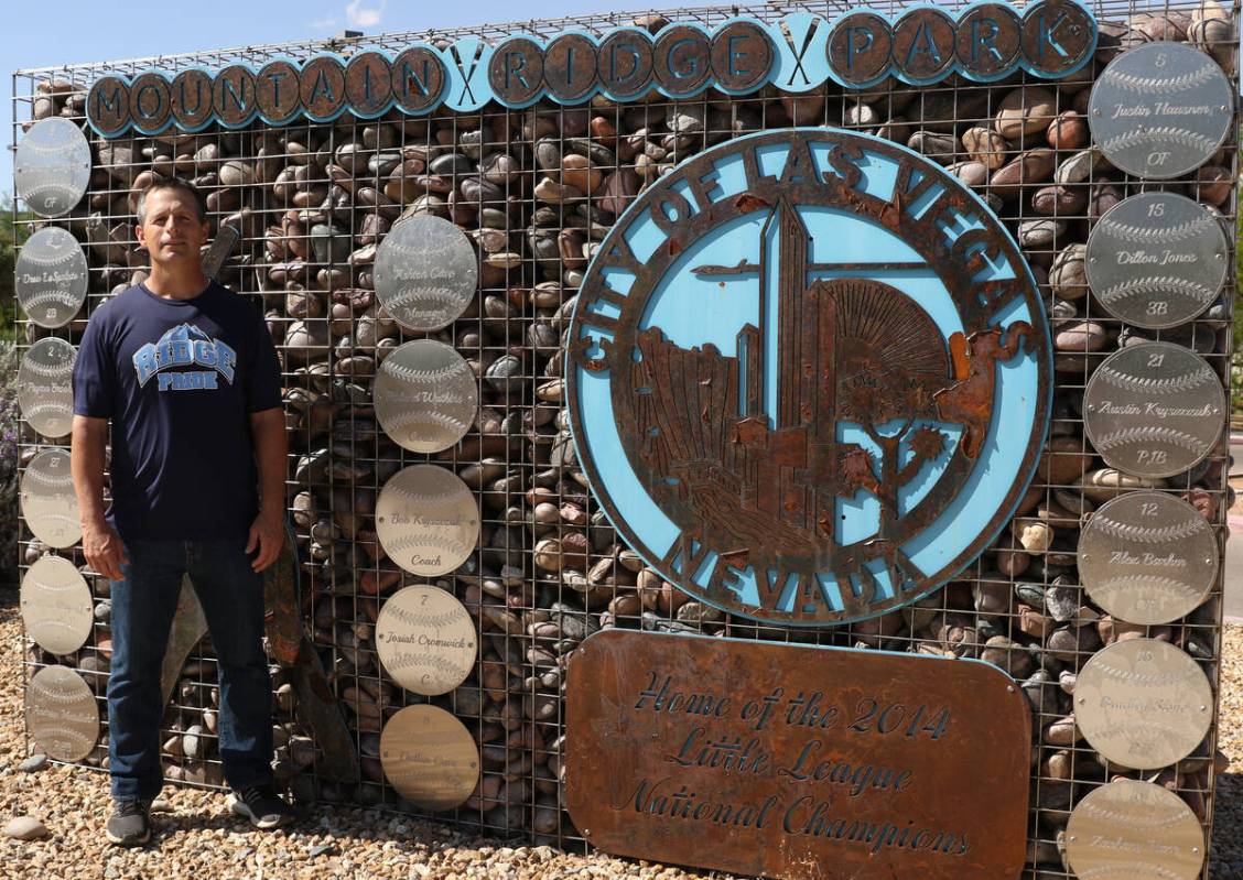 Ashton Cave, who managed the Mountain Ridge team during the 2014 Little League World Series, po ...