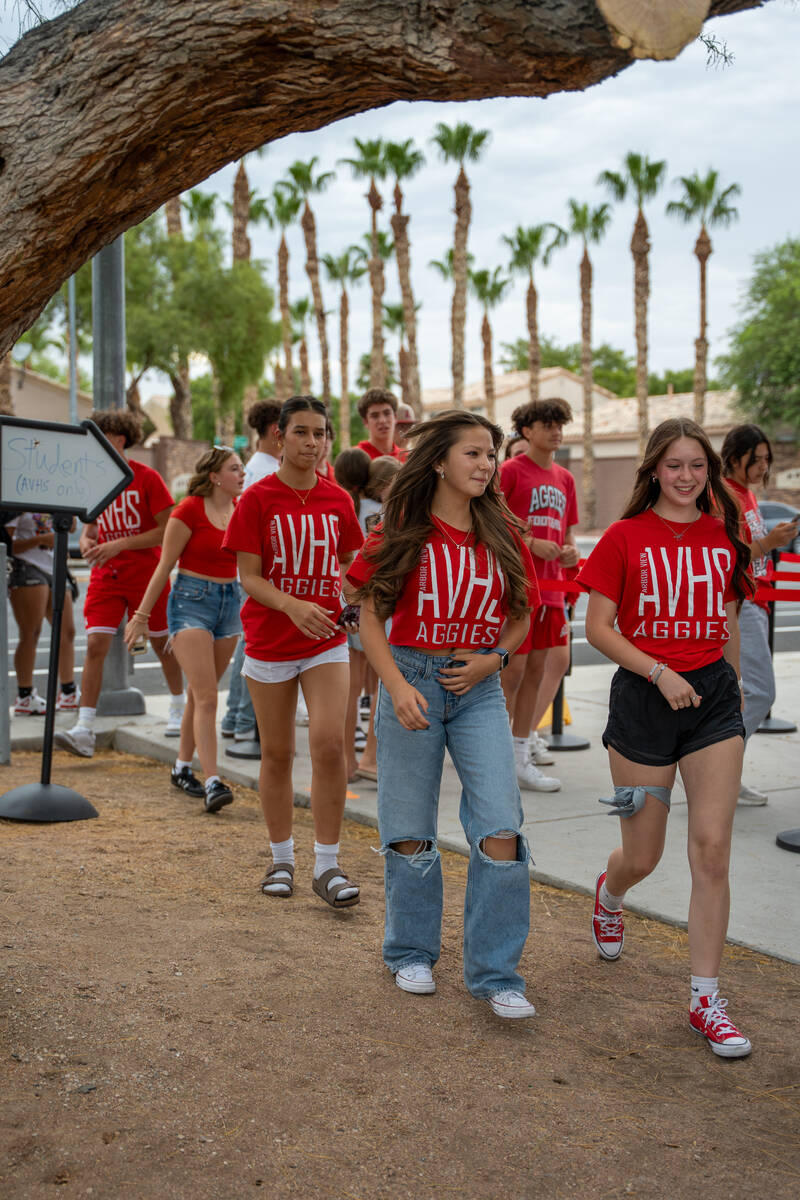 Students arrive at a “red out” football game between Mililani and Arbor View at A ...