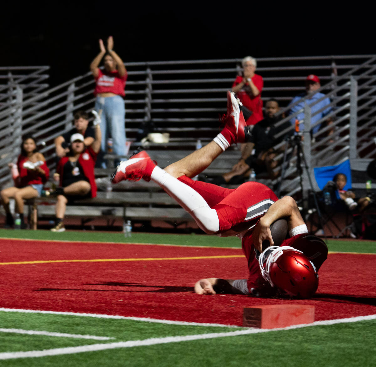 Arbor View Quarterback Thaddeus Thatcher (7) makes it into the end zone during a football game ...