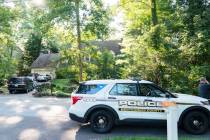 Former National Security Advisor John Bolton's house is seen with a Montgomery County, Md., pol ...