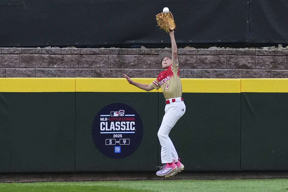 Las Vegas' Brooks Fechser catches the ball against Irmo, S.C., during the second inning of a ba ...