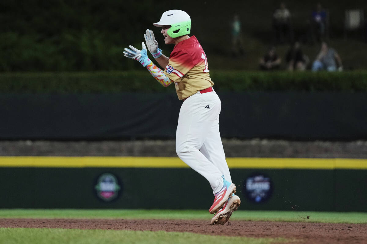 Las Vegas' Garrett Gallegos celebrates his home run during the sixth inning of a baseball game ...