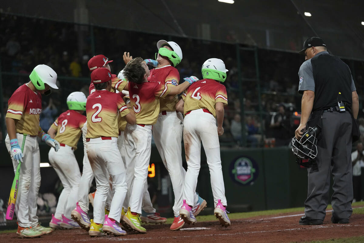 Las Vegas players celebrates Garrett Gallegos's home run during the sixth inning of a baseball ...