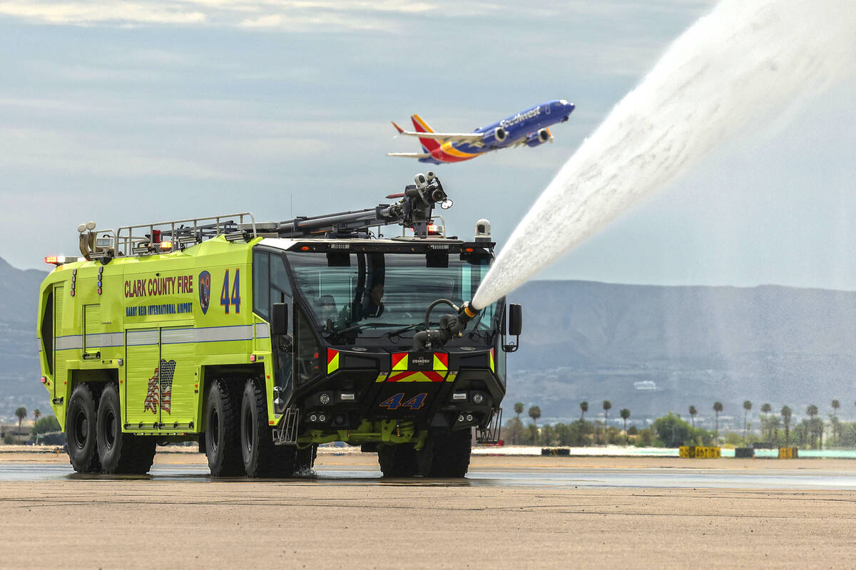 A new Aircraft Rescue and Firefighting (ARFF) vehicle during a demonstration at an unveiling ce ...