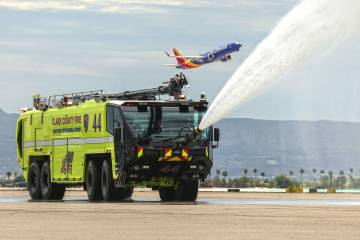 A new Aircraft Rescue and Firefighting (ARFF) vehicle during a demonstration at an unveiling ce ...
