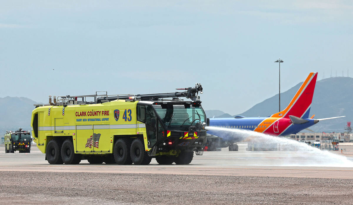 A new Aircraft Rescue and Firefighting (ARFF) vehicle during a demonstration at an unveiling ce ...