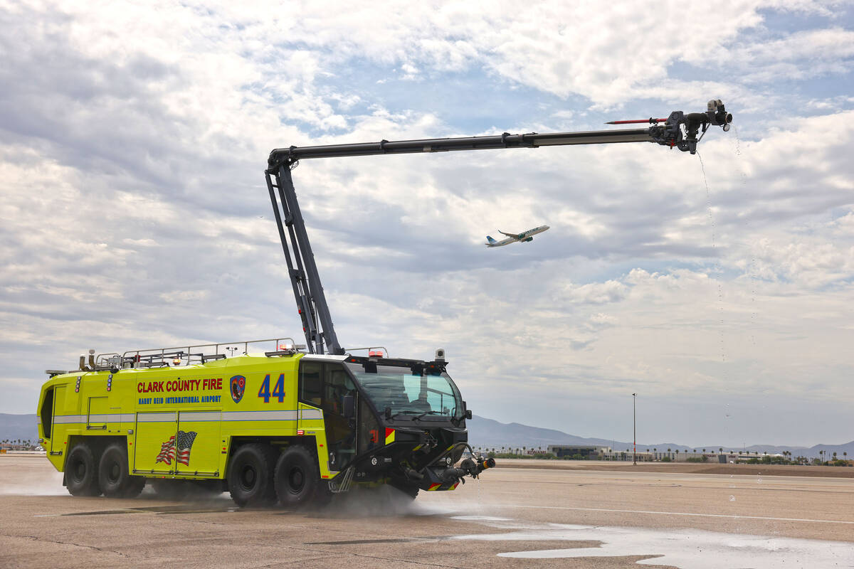 A new Aircraft Rescue and Firefighting (ARFF) vehicle during a demonstration at an unveiling ce ...