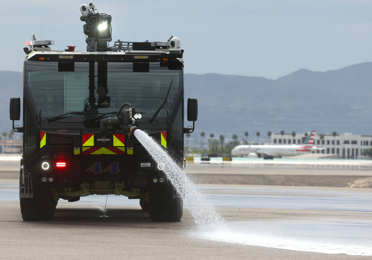 A new Aircraft Rescue and Firefighting (ARFF) vehicle during a demonstration at an unveiling ce ...