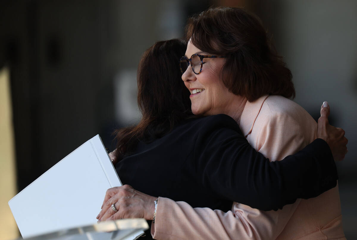 Sen. Jacky Rosen, D-Nev., right, hugs Clark County Department of Aviation Director Rosemary Vas ...