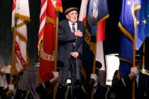 World War II veteran Onofrio "No-No" Zicari places his hand over his heart during the pledge of ...
