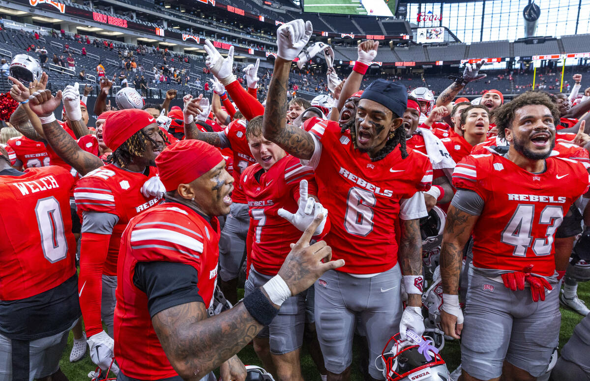 UNLV players dance and sing the school fight song defeating the Idaho State Bengals during thei ...