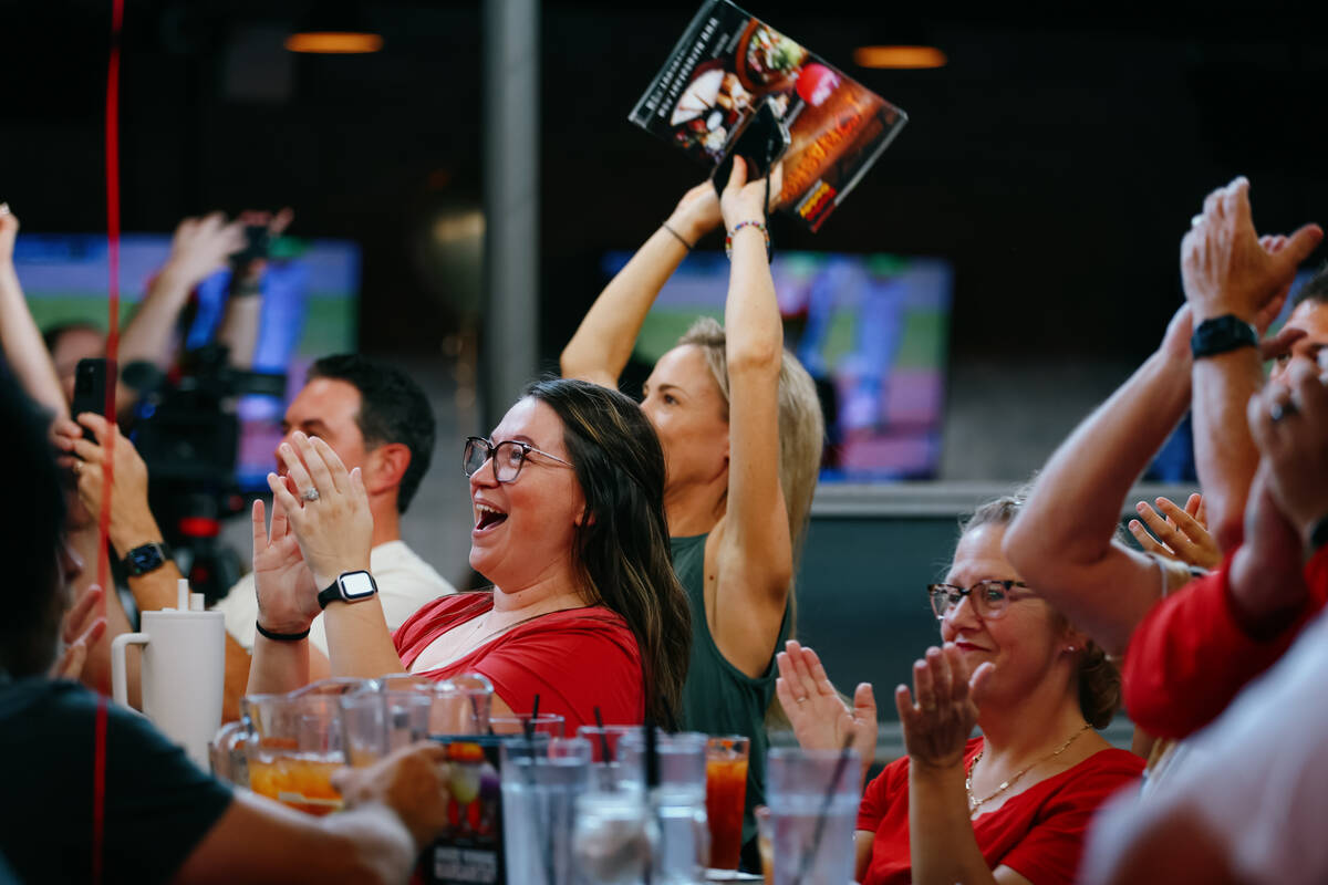 Fans cheer during a Little League World Series watch party supporting Summerlin South on Saturd ...