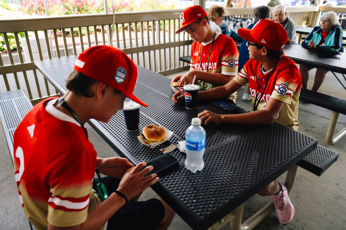 Summerlin South teammates sit for a lunch before a Little League World Series game between Summ ...