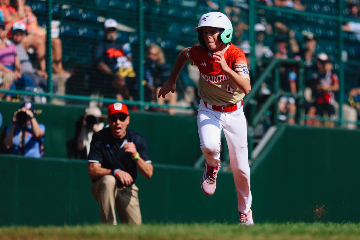 Summerlin South center fielder Brooks Fechser runs to home base during a Little League World Se ...