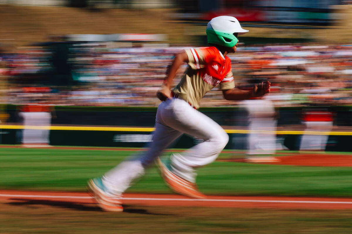 Summerlin South right fielder Cutter Ricafort runs to first base during a Little League World S ...
