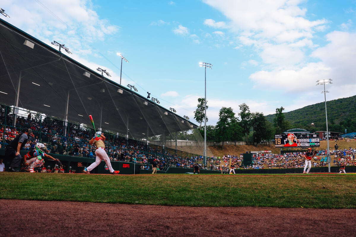 Summerlin South pitcher Garrett Gallegos (19) swings at the ball during a Little League World S ...