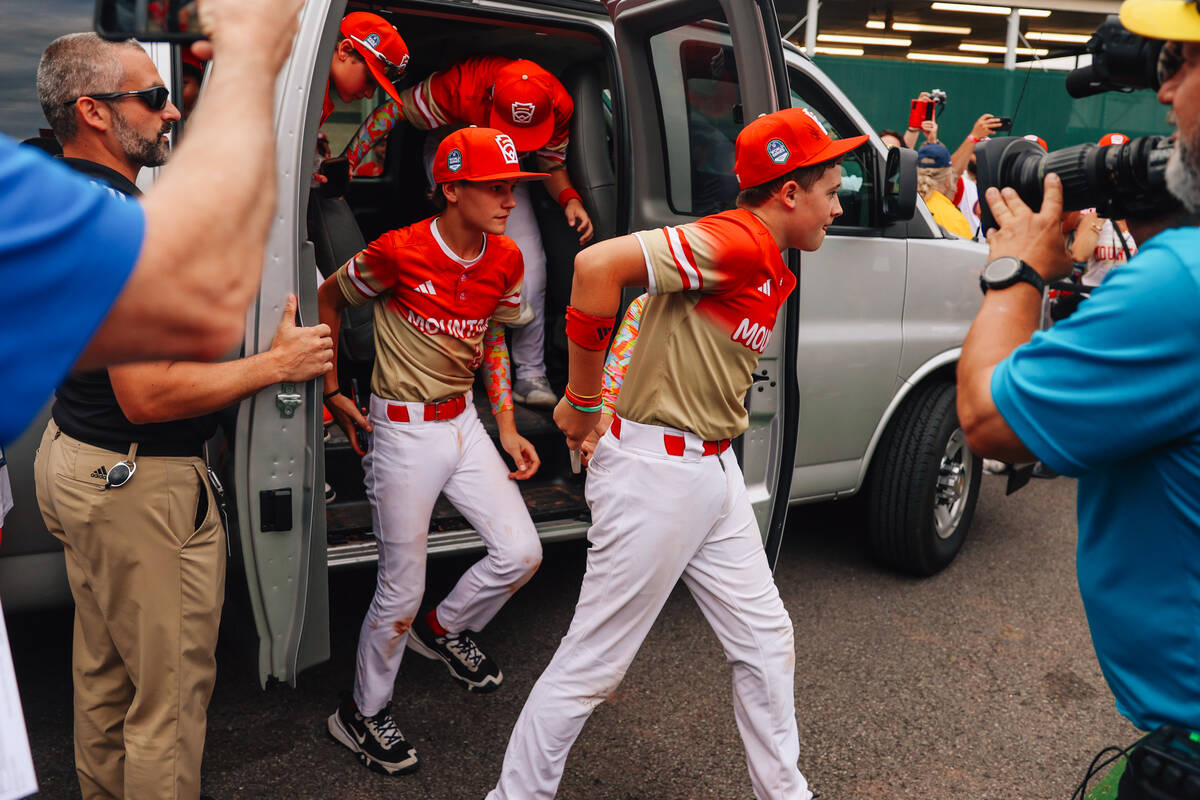 Summerlin South players exit a van after winning a Little League World Series semifinals game b ...