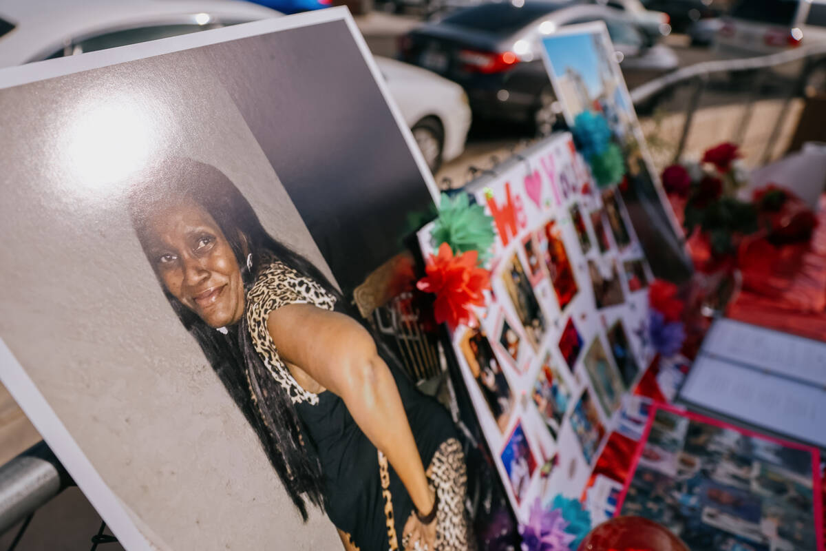 Photos of Fischele Mixon sit on display during a memorial service for her on Saturday, Aug. 23, ...