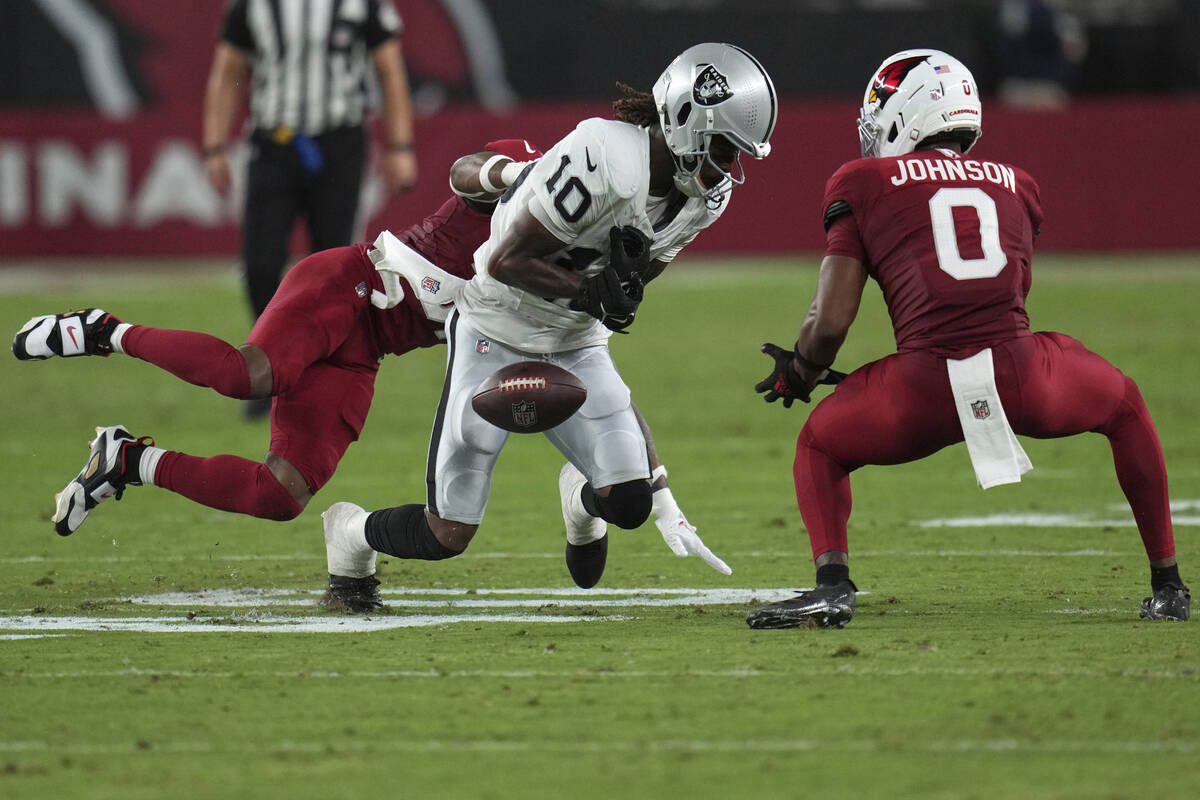 Las Vegas Raiders wide receiver Dont'e Thornton Jr. (10) can't make the catch as Arizona Cardin ...