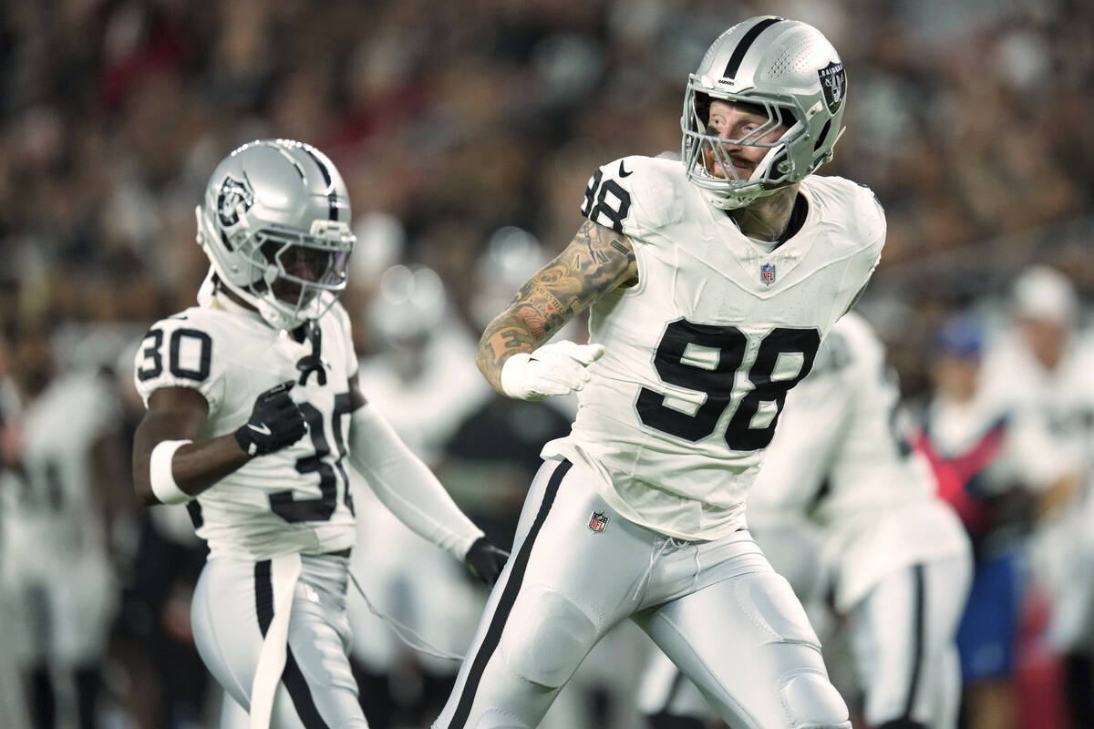Las Vegas Raiders defensive end Maxx Crosby (98) celebrates a stop agaisnt the Arizona Cardinal ...