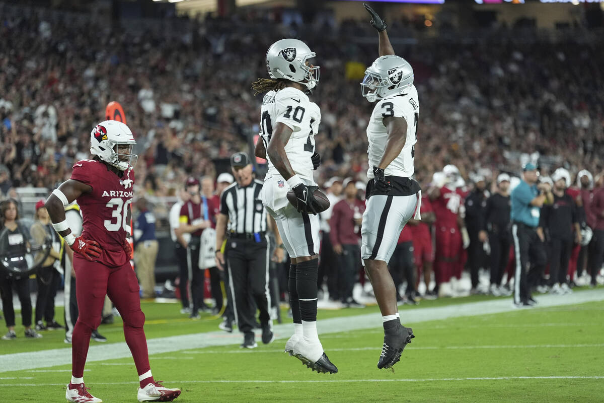 Las Vegas Raiders wide receiver Dont'e Thornton Jr. (10) celebrates his touchdown with running ...