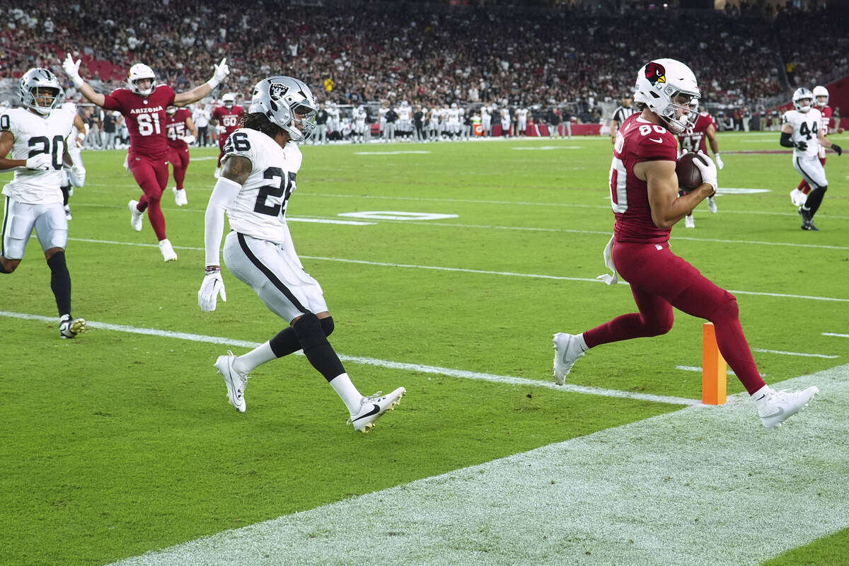 Arizona Cardinals wide receiver Simi Fehoko (80) scores a toucdown as Las Vegas Raiders cornerb ...