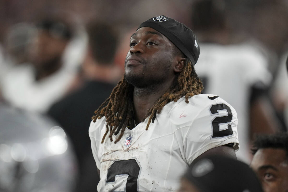 Las Vegas Raiders running back Ashton Jeanty (2) watches from the sidelines during the first ha ...