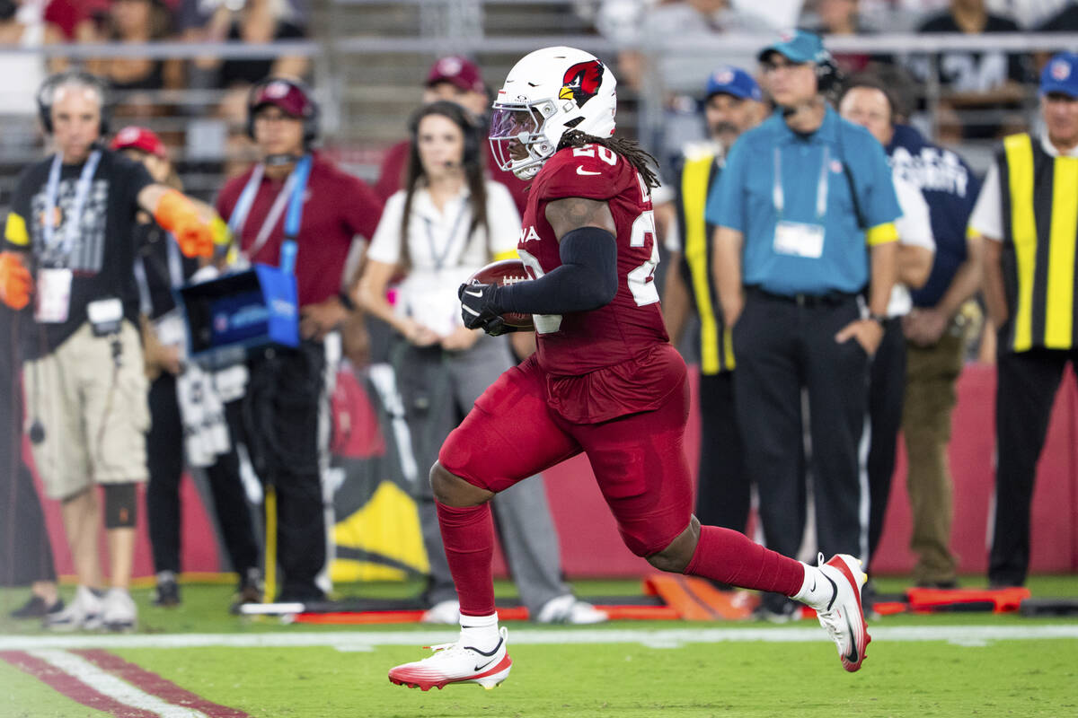 Arizona Cardinals running back DeeJay Dallas (20) runs with the ball in a preseason NFL footbal ...