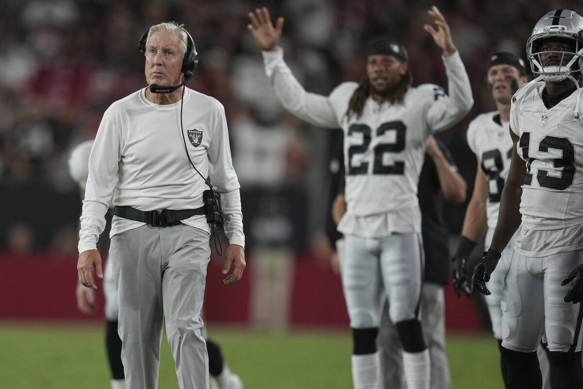 Las Vegas Raiders head coach Pete Carroll watches during the first half of an NFL preseason foo ...