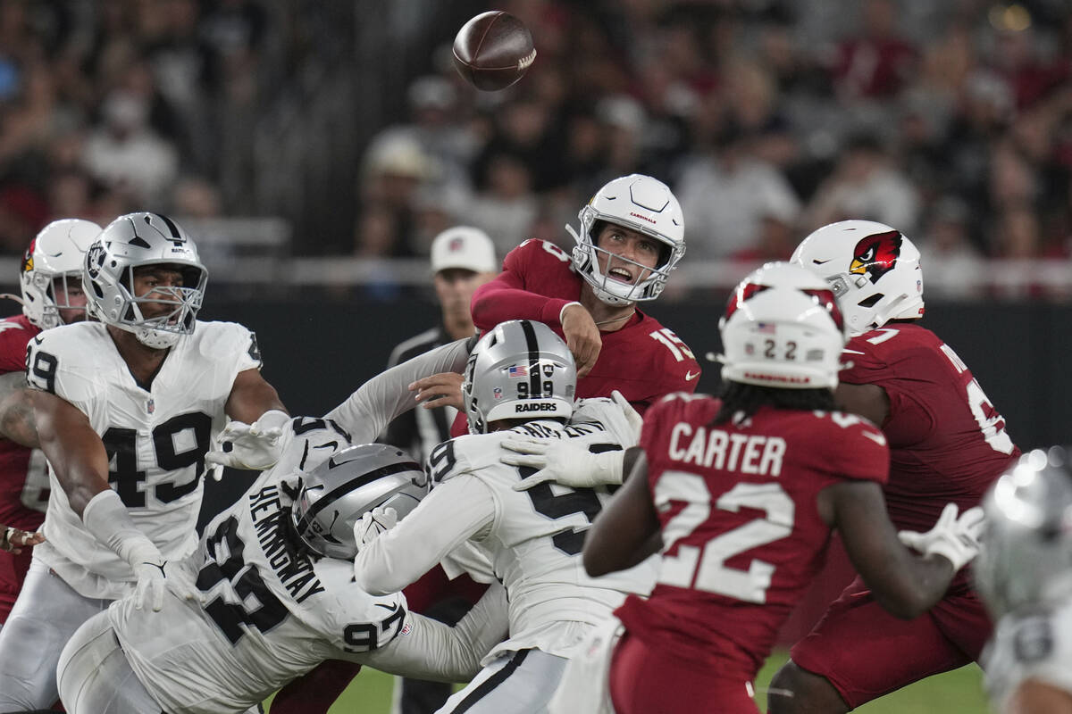 Arizona Cardinals quarterback Clayton Tune throws agaisnt the Las Vegas Raiders during the firs ...
