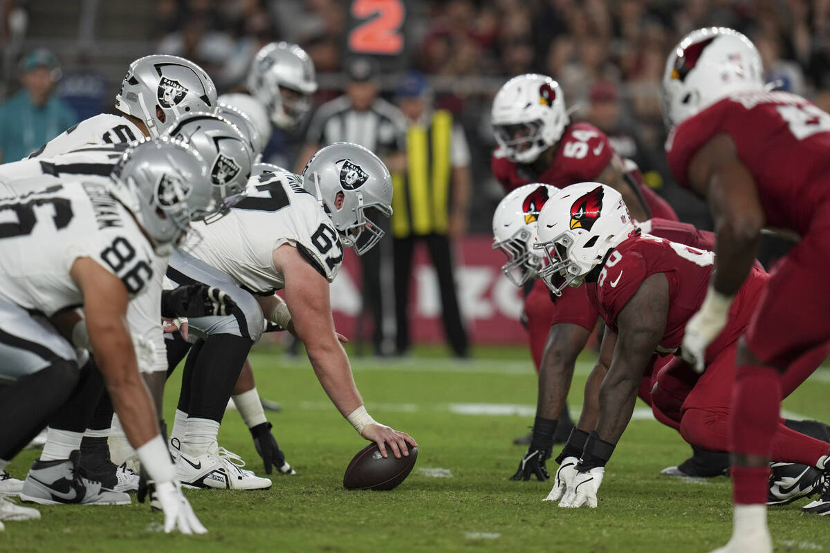 The Las Vegas Raiders and the Arizona Cardinals line up during the first half of an NFL preseas ...