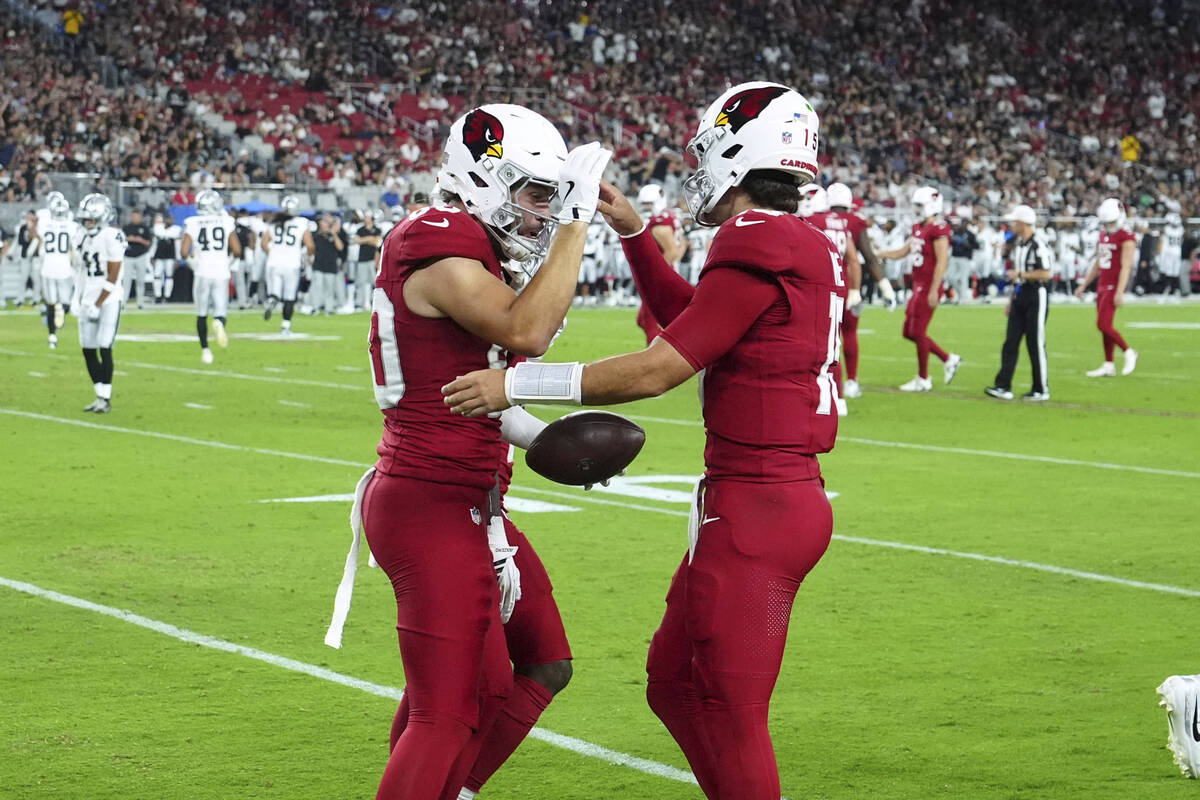 Arizona Cardinals wide receiver Simi Fehoko, left, celebrates his touchwon with quarterback Cla ...