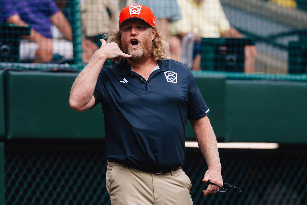 Summerlin South head coach TJ Fechser makes a signal during a Little League World Series semifi ...