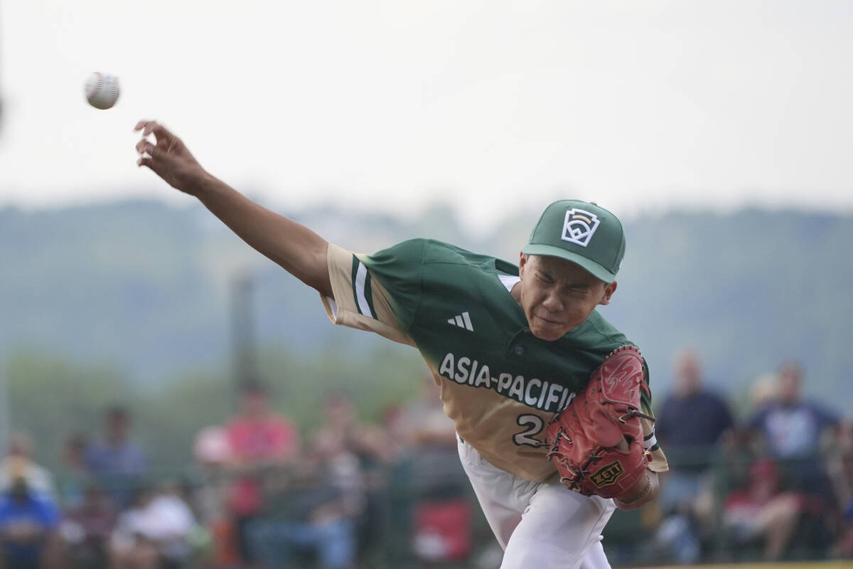 Taiwan's Lin Chin-Tse pitches against Mexico during the first inning of a baseball game at ...