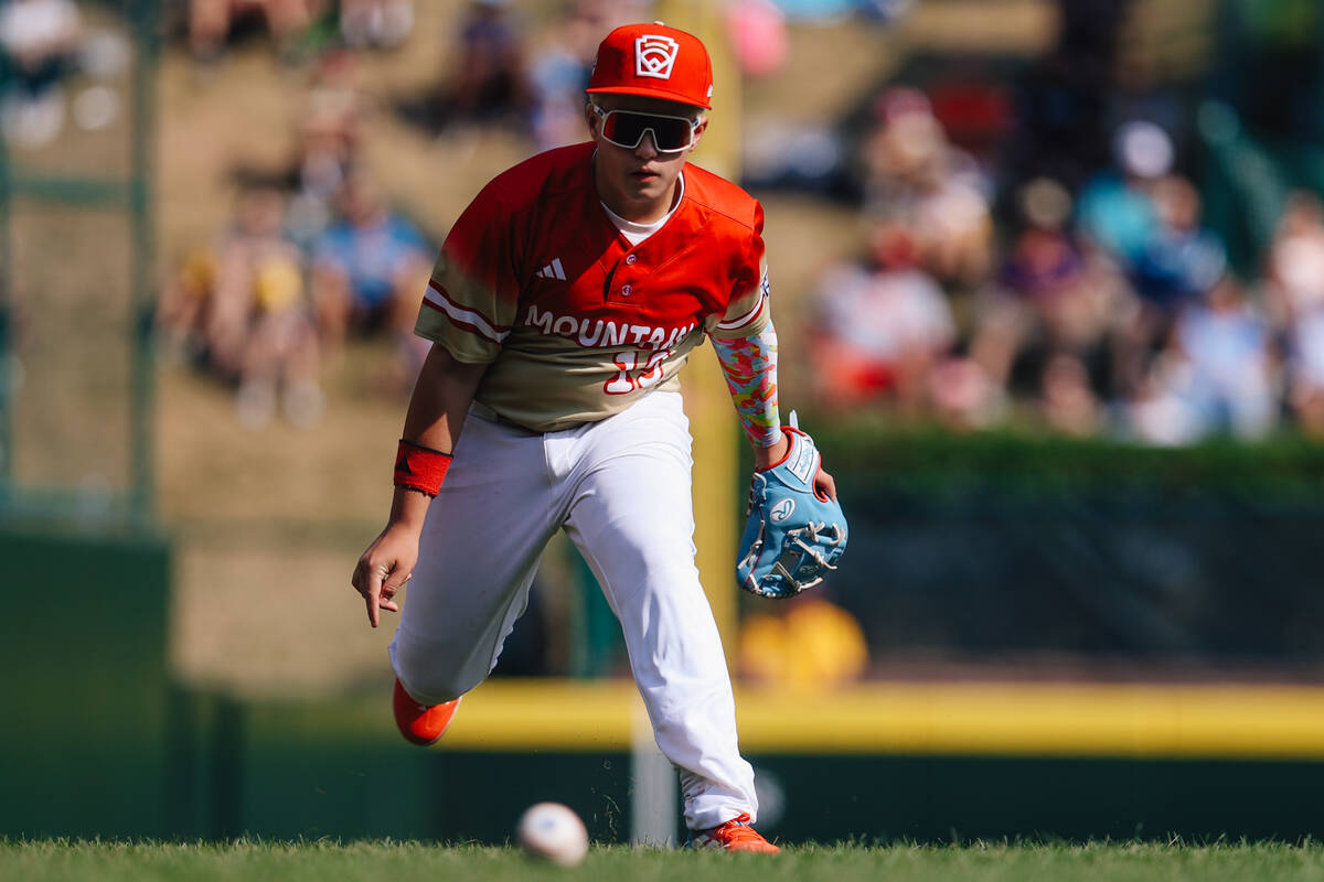 Summerlin South third baseman Garrett Gallegos runs toward the ball during a Little League Worl ...
