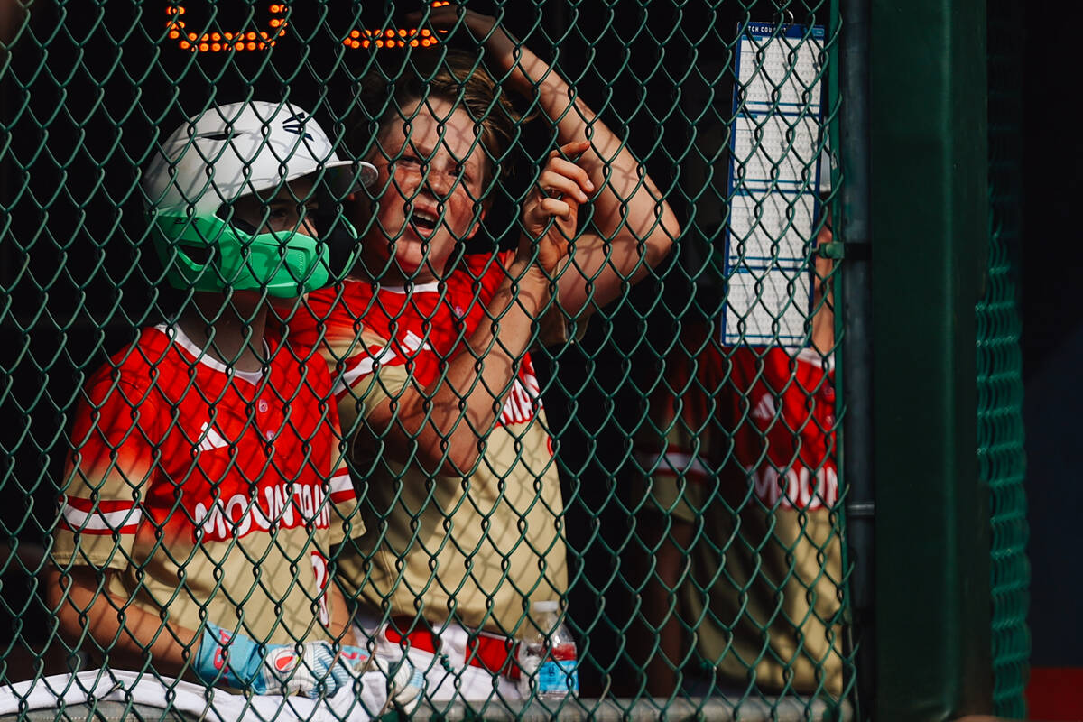 Summerlin South teammates watch game action in the dugout during a Little League World Series w ...